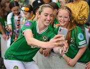16 July 2024; Megan Connolly of Republic of Ireland takes a selfie with supporters after the 2025 UEFA Women's European Championship qualifying group A match between Republic of Ireland and France at Páirc Uí Chaoimh in Cork. Photo by Stephen McCarthy/Sportsfile