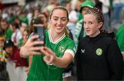 16 July 2024; Megan Connolly of Republic of Ireland with supporters after the 2025 UEFA Women's European Championship qualifying group A match between Republic of Ireland and France at Páirc Uí Chaoimh in Cork. Photo by Stephen McCarthy/Sportsfile
