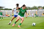 16 July 2024; Jess Ziu of Republic of Ireland in action against Ève Périsset of France during the 2025 UEFA Women's European Championship qualifying group A match between Republic of Ireland and France at Páirc Uí Chaoimh in Cork. Photo by Stephen McCarthy/Sportsfile