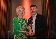 19 July 2024; Lifetime Achievement award recepient and former Dublin camogie player Kay Ryder is presented with her award by GPA President Dónal Óg Cusack during the GPA Hurling & Camogie Legends Lunch at Croke Park in Dublin. Photo by Sam Barnes/Sportsfile