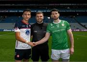 14 July 2024; Referee Conor Dourneen with the two captains Dylan Curran of New York and Ryan Forde of London  before the GAA Football All-Ireland Junior Championship final between London and New York at Croke Park in Dublin. Photo by Ray McManus/Sportsfile