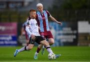 19 July 2024; Aodh Dervin of Dundalk in action against Shane Farrell of Drogheda United during the Sports Direct Men’s FAI Cup second round match between Drogheda United and Dundalk at Weavers Park in Drogheda, Louth. Photo by Shauna Clinton/Sportsfile