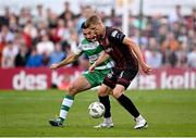 19 July 2024; Filip Piszczek of Bohemians in action against Roberto Lopes of Shamrock Rovers during the Sports Direct Men’s FAI Cup second round match between Bohemians and Shamrock Rovers at Dalymount Park in Dublin. Photo by Seb Daly/Sportsfile