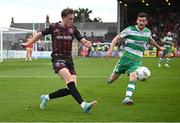 19 July 2024; Cian Byrne of Bohemians in action against Aaron Greene of Shamrock Rovers during the Sports Direct Men’s FAI Cup second round match between Bohemians and Shamrock Rovers at Dalymount Park in Dublin. Photo by Seb Daly/Sportsfile