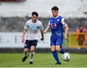 19 July 2024; Thomas Considine of Treaty United in action against Lewis Skelly of Kilbarrack United during the Sports Direct Men’s FAI Cup second round match between Treaty United and Kilbarrack United at Markets Field in Limerick. Photo by Michael P Ryan/Sportsfile