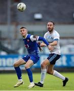 19 July 2024; Lee Devitt of Treaty United in action against Aaron Humphries of Kilbarrack United during the Sports Direct Men’s FAI Cup second round match between Treaty United and Kilbarrack United at Markets Field in Limerick. Photo by Michael P Ryan/Sportsfile