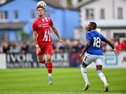 19 July 2024; Colin Mooney of Sligo Rovers in action against Ashley Young of Everton during the pre-season friendly match between Sligo Rovers and Everton at The Showgrounds in Sligo. Photo by Stephen Marken/Sportsfile