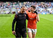 29 June 2024; Joe McElroy of Armagh celebrates with team psychologist Hugh Campbell after the GAA Football All-Ireland Senior Championship quarter-final match between Armagh and Roscommon at Croke Park in Dublin. Photo by Stephen McCarthy/Sportsfile