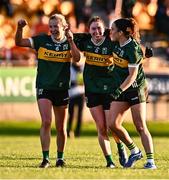 20 July 2024; Kerry players, from left, Deirdre Kearney, Eilís Lynch amd Kayleigh Cronin celebrate after their side's victory in the TG4 All-Ireland Ladies Football Senior Championship semi-final match between Armagh and Kerry at Glenisk O’Connor Park in Tullamore, Offaly. Photo by Piaras Ó Mídheach/Sportsfile