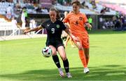 21 July 2024; Joy Ralph of Republic of Ireland in action against Isa Kardinaal of Netherlands during the UEFA Women's Under-19 European Championships Group B match between Republic of Ireland and Netherlands at Futbolo Stadionas Marijampoleje in Marijampole, Lithuania. Photo by Saulius Cirba/Sportsfile