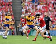 21 July 2024; Robert Downey of Cork in action against Conor Leen of Clare during the GAA Hurling All-Ireland Senior Championship Final between Clare and Cork at Croke Park in Dublin. Photo by Stephen McCarthy/Sportsfile