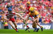 21 July 2024; Mark Rodgers of Clare is tackled by Cork goalkeeper Patrick Collins during the GAA Hurling All-Ireland Senior Championship Final between Clare and Cork at Croke Park in Dublin. Photo by Brendan Moran/Sportsfile