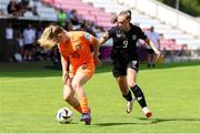 21 July 2024; Senne Van De Velde of Netherlands, left, in action against Joy Ralph of Republic of Ireland during the UEFA Women's Under-19 European Championships Group B match between Republic of Ireland and Netherlands at Futbolo Stadionas Marijampoleje in Marijampole, Lithuania. Photo by Saulius Cirba/Sportsfile