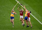 21 July 2024; David Fitzgerald, left, and Peter Duggan of Clare in action against Mark Coleman, left and Eoin Downey of Cork during the GAA Hurling All-Ireland Senior Championship Final between Clare and Cork at Croke Park in Dublin. Photo by Daire Brennan/Sportsfile