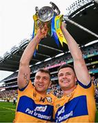 21 July 2024; Clare players Shane O'Donnell, left, and Paul Flanagan celebrate with the Liam MacCarthy Cup after their side's victory in the GAA Hurling All-Ireland Senior Championship Final match between Clare and Cork at Croke Park in Dublin. Photo by Seb Daly/Sportsfile