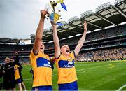 21 July 2024; Cathal Malone, left, and David Fitzgerald of Clare celebrate with the Liam McCarthy cup after the GAA Hurling All-Ireland Senior Championship Final between Clare and Cork at Croke Park in Dublin. Photo by David Fitzgerald/Sportsfile