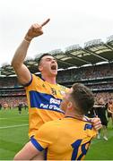 21 July 2024; Ryan Taylor of Clare, top, celebrates with team-mate Paul Flanagan  after their side's victory in the GAA Hurling All-Ireland Senior Championship Final between Clare and Cork at Croke Park in Dublin. Photo by Sam Barnes/Sportsfile