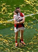 21 July 2024; Patrick Horgan of Cork with his son Jack, aged 2, after the GAA Hurling All-Ireland Senior Championship Final between Clare and Cork at Croke Park in Dublin. Photo by Daire Brennan/Sportsfile