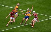 21 July 2024; Adam Hogan of Clare in action against Alan Connolly, left, and Patrick Horgan of Cork during the GAA Hurling All-Ireland Senior Championship Final between Clare and Cork at Croke Park in Dublin. Photo by Daire Brennan/Sportsfile