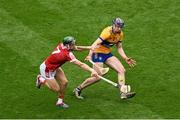 21 July 2024; David Fitzgerald of Clare in action against Mark Coleman of Cork during the GAA Hurling All-Ireland Senior Championship Final between Clare and Cork at Croke Park in Dublin. Photo by Daire Brennan/Sportsfile