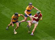 21 July 2024; Mark Coleman of Cork in action against Cathal Malone, left, and David Fitzgerald of Clare during the GAA Hurling All-Ireland Senior Championship Final between Clare and Cork at Croke Park in Dublin. Photo by Daire Brennan/Sportsfile