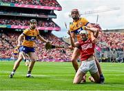 21 July 2024; Tim O'Mahony of Cork is tackled by Peter Duggan of Clare during the GAA Hurling All-Ireland Senior Championship Final between Clare and Cork at Croke Park in Dublin. Photo by Piaras Ó Mídheach/Sportsfile