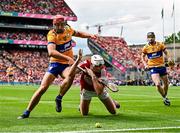 21 July 2024; Tim O'Mahony of Cork in action against Peter Duggan of Clare during the GAA Hurling All-Ireland Senior Championship Final between Clare and Cork at Croke Park in Dublin. Photo by Piaras Ó Mídheach/Sportsfile