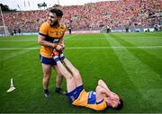 21 July 2024; Adam Hogan of Clare celebrates with Conor Leen, 4, after the GAA Hurling All-Ireland Senior Championship Final between Clare and Cork at Croke Park in Dublin. Photo by Ray McManus/Sportsfile
