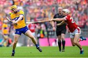 21 July 2024; Shane Meehan of Clare in action against Luke Meade of Cork during the GAA Hurling All-Ireland Senior Championship Final between Clare and Cork at Croke Park in Dublin. Photo by John Sheridan/Sportsfile