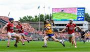 21 July 2024; Tony Kelly of Clare in action against Cork players, from right, Tim O'Mahony, Ciarán Joyce and Seán O'Donoghue during the GAA Hurling All-Ireland Senior Championship Final between Clare and Cork at Croke Park in Dublin. Photo by John Sheridan/Sportsfile