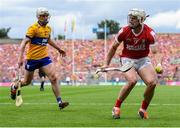 21 July 2024; Patrick Horgan of Cork in action against Adam Hogan of Clare during the GAA Hurling All-Ireland Senior Championship Final between Clare and Cork at Croke Park in Dublin. Photo by John Sheridan/Sportsfile