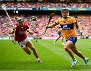 21 July 2024; Ian Galvin of Clare in action against Mark Coleman of Cork during the GAA Hurling All-Ireland Senior Championship Final match between Clare and Cork at Croke Park in Dublin. Photo by Seb Daly/Sportsfile