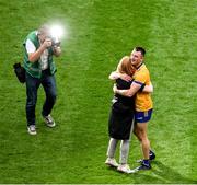 21 July 2024; Photographer John Kelly photographs Ryan Taylor of Clare as he celebrates with Clare GAA Chief Operating Officer Deirdre Murphy after the GAA Hurling All-Ireland Senior Championship Final between Clare and Cork at Croke Park in Dublin. Photo by Daire Brennan/Sportsfile