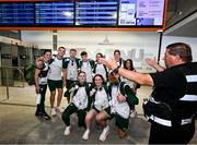 22 July 2024; Airport security intervenes during a photo of Team Ireland boxers, back row, from left, Kellie Harrington, Jack Marley, Dean Clancy, Jude Gallagher, Grainne Walsh, Aoife O'Rourke and Daina Moorhouse and front row, from left, Michaela Walsh, Jennifer Lehane and Aidan Walsh on their arrival at Charles de Gaulle airport in Paris ahead of the 2024 Paris Summer Olympic Games in Paris, France. Photo by David Fitzgerald/Sportsfile