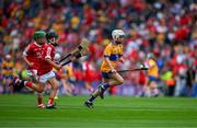 21 July 2024; Darragh Pettitt, Murrintown NS, Murrintown, Wexford, representing Clare races clear of Liam Meade, Ballyfin NS, Ballyfin, Laois, representing Cork amd Shay Mallie, Scoil Mhuire na mBuachaillí, Monaghan, representing Cork during the GAA INTO Cumann na mBunscol Respect Exhibition Go Games at the GAA Hurling All-Ireland Senior Championship final between Clare and Cork at Croke Park in Dublin. Photo by Ray McManus/Sportsfile