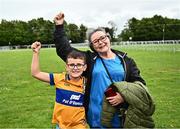 22 July 2024; Óran Neville, seven years, from Cratloe, with his grandmother Eileen McKee, from Shannon, before the homecoming celebrations of the All-Ireland Senior Hurling Champions at Active Ennis Tim Smythe Park in Clare. Photo by Piaras Ó Mídheach/Sportsfile