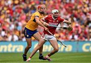 21 July 2024; Tim O'Mahony of Cork in action against Peter Duggan of Clare during the GAA Hurling All-Ireland Senior Championship Final between Clare and Cork at Croke Park in Dublin. Photo by Sam Barnes/Sportsfile