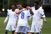 22 July 2024; Valentin Atangana of France, 8, celebrates with team-mates after scoring his side's second goal during the UEFA European U19 Championship finals match between Spain and France at Inver Park in Larne, Northern Ireland. Photo by Shauna Clinton/Sportsfile