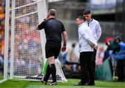 21 July 2024; Referee Johnny Murphy consults with his umpires during the GAA Hurling All-Ireland Senior Championship Final between Clare and Cork at Croke Park in Dublin. Photo by Ray McManus/Sportsfile