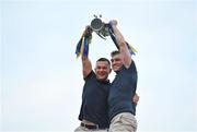 22 July 2024; Shane O'Donnell, right, and David Reidy of Clare with the Liam MacCarthy cup during the homecoming celebrations of the All-Ireland Senior Hurling Champions at Active Ennis Tim Smythe Park in Clare. Photo by John Sheridan/Sportsfile