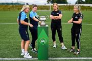 23 July 2024; In attendance, from left, Terenure Rangers manager Caroline Kelly, left, and captain Niamh Carroll with Whitehall Rangers AFC player/secretary Jennifer Kett and captain Charlie Graham view the cup before the FAI Women’s Amateur Cup Final Preview Event at FAI HQ in Dublin. Photo by Ben McShane/Sportsfile