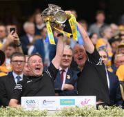 21 July 2024; Pad Joe Keane, left, and Brian McAllister lift the Liam MacCarthy cup following victory in the GAA Hurling All-Ireland Senior Championship Final between Clare and Cork at Croke Park in Dublin. Photo by Stephen McCarthy/Sportsfile