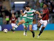 23 July 2024; Roberto Lopes of Shamrock Rovers in action against Victor Olatunji of Sparta Prague during the UEFA Champions League second qualifying round first leg match between Shamrock Rovers and Sparta Prague at Tallaght Stadium in Dublin. Photo by Thomas Flinkow/Sportsfile