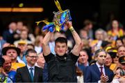 21 July 2024; Paddy Donnellan of Clare lifts the Liam MacCarthy cup following victory in the GAA Hurling All-Ireland Senior Championship Final between Clare and Cork at Croke Park in Dublin. Photo by Stephen McCarthy/Sportsfile