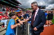 21 July 2024; Uachtarán Chumann Lúthchleas Gael Jarlath Burns meets young Clare supporters before the GAA Hurling All-Ireland Senior Championship Final between Clare and Cork at Croke Park in Dublin. Photo by Brendan Moran/Sportsfile