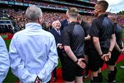 21 July 2024; President of Ireland Michael D Higgins, in the company of Uachtarán Chumann Lúthchleas Gael Jarlath Burns, meets the match officials before the GAA Hurling All-Ireland Senior Championship Final between Clare and Cork at Croke Park in Dublin. Photo by Brendan Moran/Sportsfile