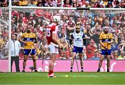 21 July 2024; Clare players, from left, John Conlon, goalkeeper Eibhear Quilligan and Conor Leen await a free from Patrick Horgan of Cork during the GAA Hurling All-Ireland Senior Championship Final between Clare and Cork at Croke Park in Dublin. Photo by Piaras Ó Mídheach/Sportsfile