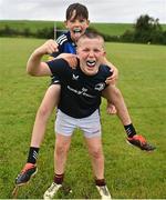 24 July 2024; Conor O'Buachalla, front, and Billy Kavanagh during the Bank of Ireland Leinster Rugby Summer Camp at De la Salle Palmerston Rugby Club in Dublin. Photo by Stephen Marken/Sportsfile