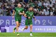 24 July 2024; Hugo Keenan, left, and Mark Roche of Team Ireland during the Men's Rugby Sevens Pool A match between Team Ireland and Team Japan at the Stade de France during the 2024 Paris Summer Olympic Games in Paris, France. Photo by David Fitzgerald/Sportsfile