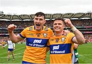 21 July 2024; David Fitzgerald, left, and Paul Flanagan of Clare celebrate after their side's victory in the GAA Hurling All-Ireland Senior Championship Final between Clare and Cork at Croke Park in Dublin. Photo by Sam Barnes/Sportsfile
